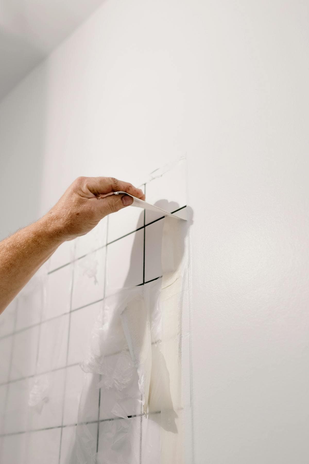 Flooded residential interior in Denton, Texas with standing water near the foundation and a dehumidifier in place during professional restoration