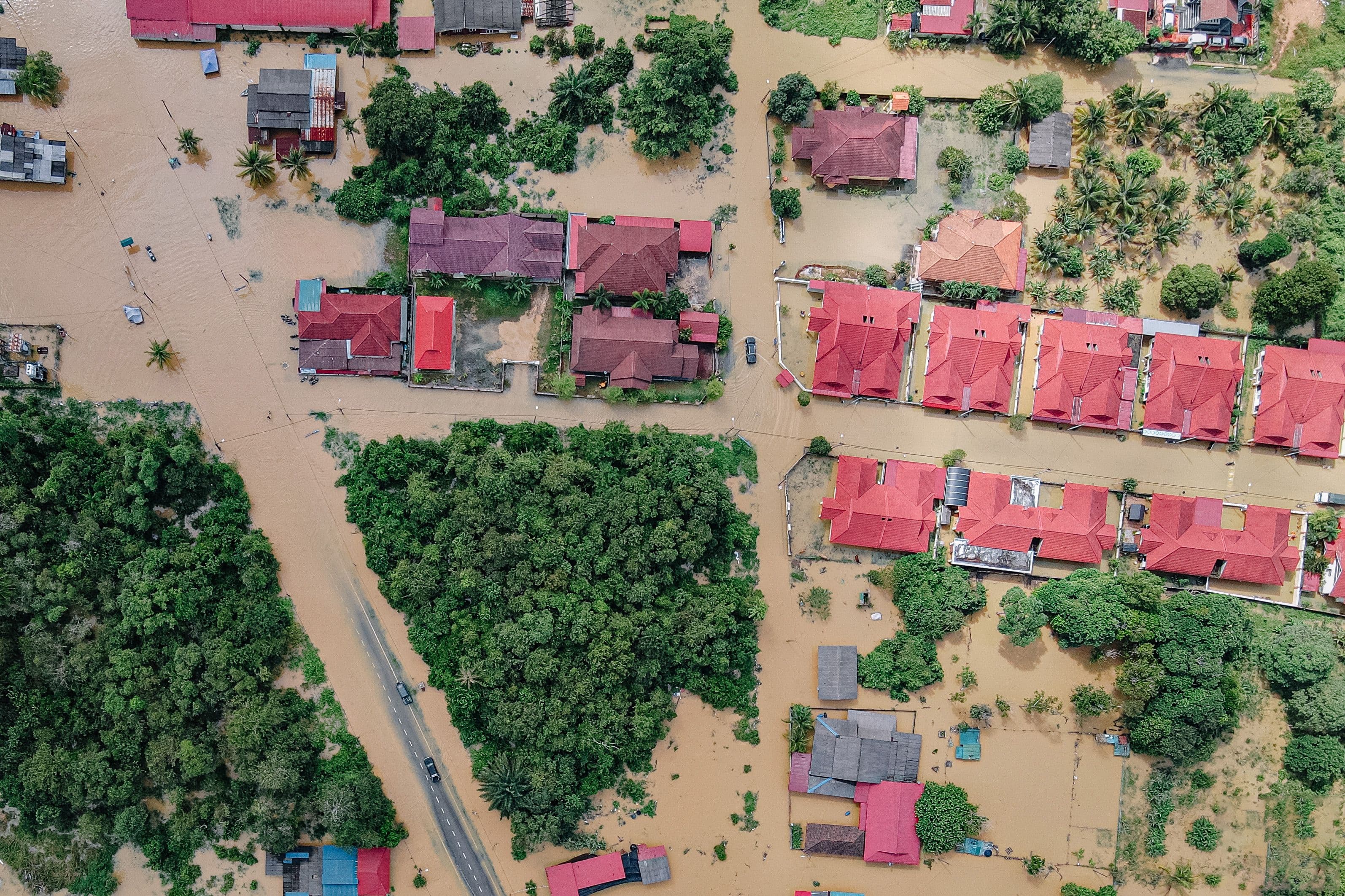 Flooded residential area protected by flood barriers during heavy rain in Fort Worth, Texas