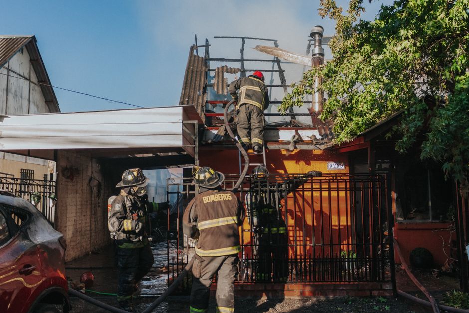 GOAT restoration crew deploying equipment at a Dallas property after a house fire, showing professional emergency response with dehumidifiers and air scrubbers